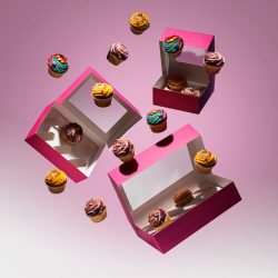 flying pink cupcake boxes